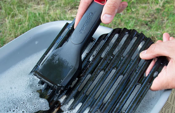 Clean the drip trays and grill grates