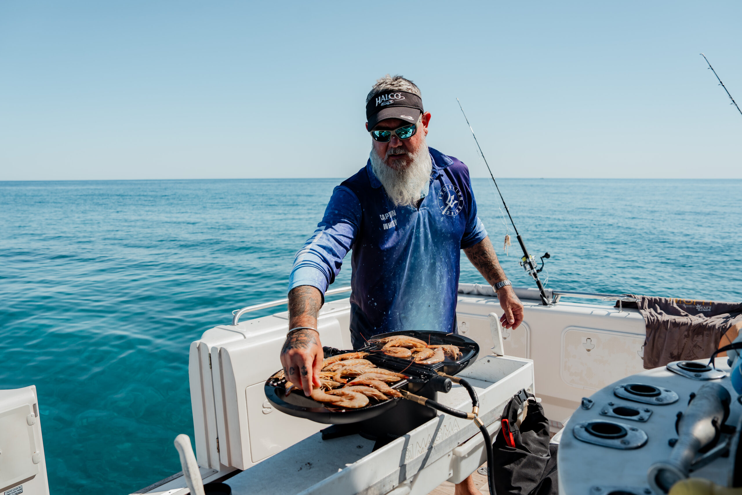 nomadiQ BBQ cooking on a boat off Exmouth, Western Australia